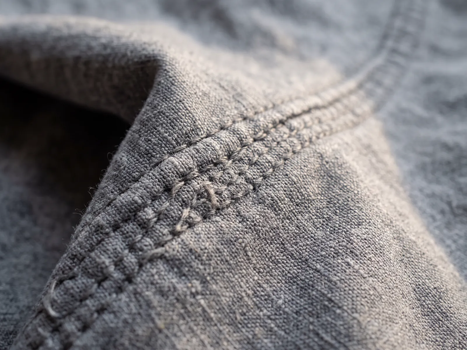 Close-up of triple-needle stitching